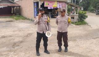 Polsek Langgam Gencarkan Imbauan Larangan Karhutla Lewat Pengeras Suara